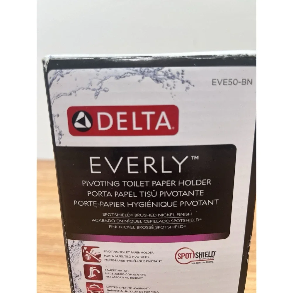 Delta Everly Wall Mount Pivot Arm Toilet Paper Holder Brushed Nickel NEW